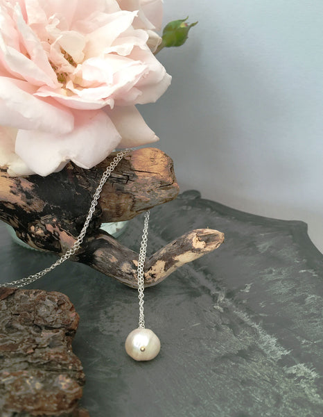 Cream Pearl Necklace with a hint of gold