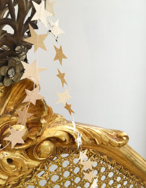 Tenderly cut from the pages of old novels and French music paper, these delicate Tiny Star garlands transport you back in time.