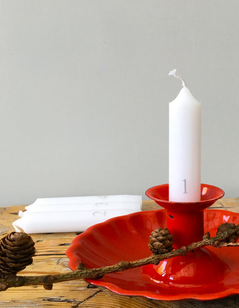 Perfect to create a little Hygge corner in your home these Danish pure white candles, are decorated with a festive count down with grey numbers.